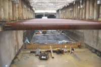 Cut-and-cover Hengsberg South (Area with arch section): Building of base plate under protection of bored pile walls with temporary bracing