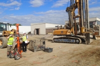Setting up of the vibro replacement piles; in the foreground lowering of a dynamic probing for the verification of the achieved compaction